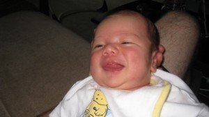 Working on his first smile/laugh